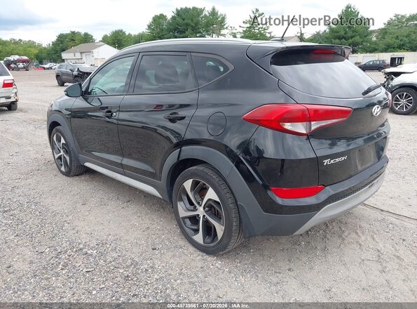 KM8J3CA29HU447679 2017 HYUNDAI TUCSON Black Rear left