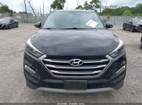 KM8J3CA29HU447679 2017 HYUNDAI TUCSON Black Front view