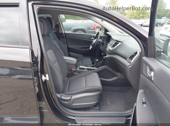 KM8J3CA29HU447679 2017 HYUNDAI TUCSON Black Front interior view