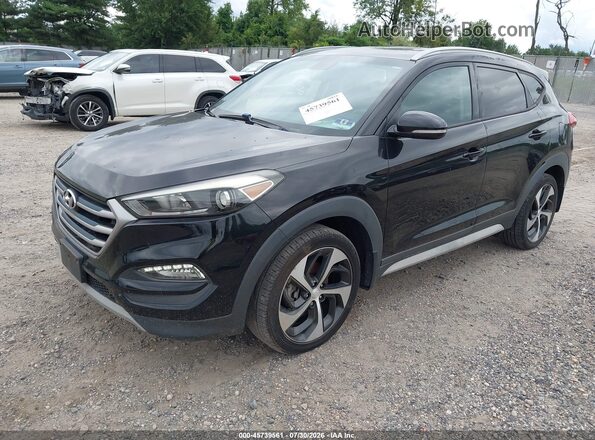 KM8J3CA29HU447679 2017 HYUNDAI TUCSON Black Front left