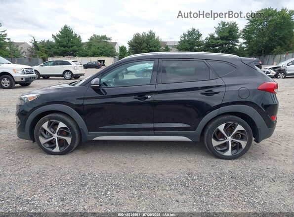 KM8J3CA29HU447679 2017 HYUNDAI TUCSON Black 360 interior view