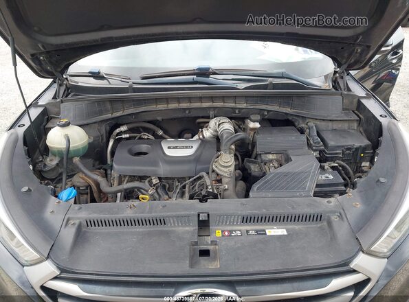 KM8J3CA29HU447679 2017 HYUNDAI TUCSON Black Rear view