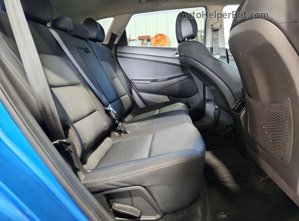 KM8J3CA29JU643367 2018 HYUNDAI TUCSON Blue Вид задньої частини салону