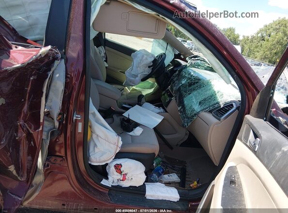 KM8J3CA2XGU035978 2016 HYUNDAI TUCSON Red Вид салону спереду