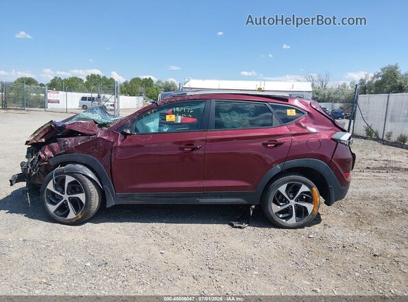 KM8J3CA2XGU035978 2016 HYUNDAI TUCSON Red Вид задньої частини салону