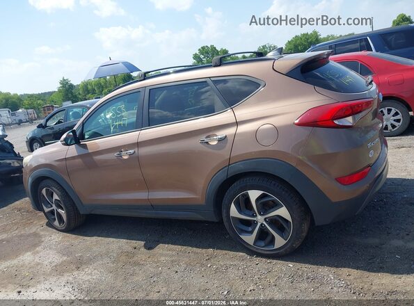 KM8J3CA2XGU110582 2016 HYUNDAI TUCSON Brown Vista interior de 360 grados