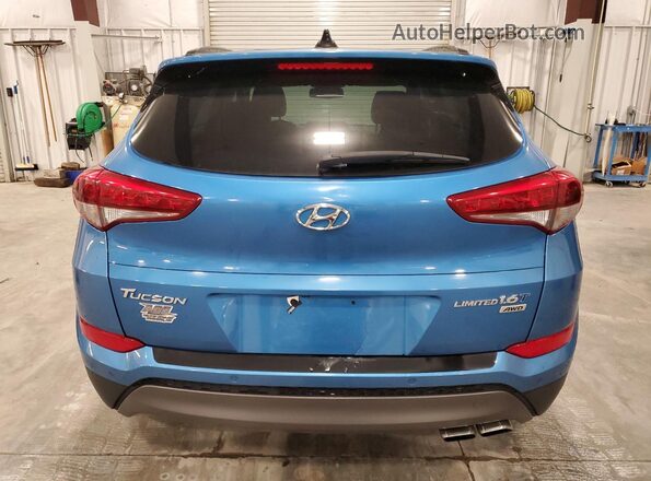 KM8J3CA2XGU130086 2016 HYUNDAI TUCSON Синий Вид сзади