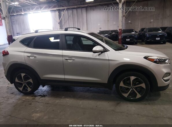 KM8J3CA2XGU155893 2016 HYUNDAI TUCSON Silver Rear interior view