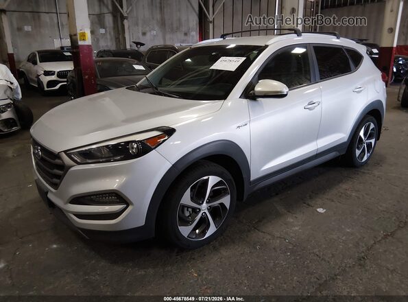 KM8J3CA2XGU155893 2016 HYUNDAI TUCSON Silver Front left