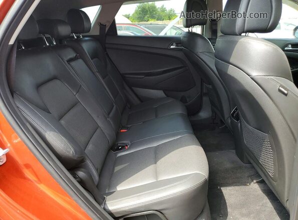 KM8J3CA2XGU165744 2016 HYUNDAI TUCSON Orange Սալոնի հետևի տեսք