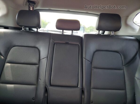 KM8J3CA2XGU165744 2016 HYUNDAI TUCSON Orange Հետևի նստատեղերի տեսք