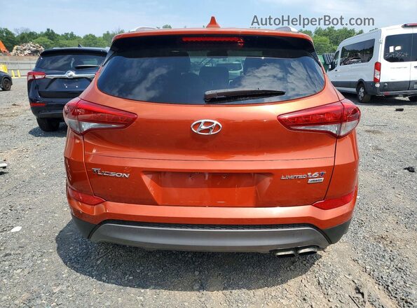 KM8J3CA2XGU165744 2016 HYUNDAI TUCSON Orange Հետևի տեսք