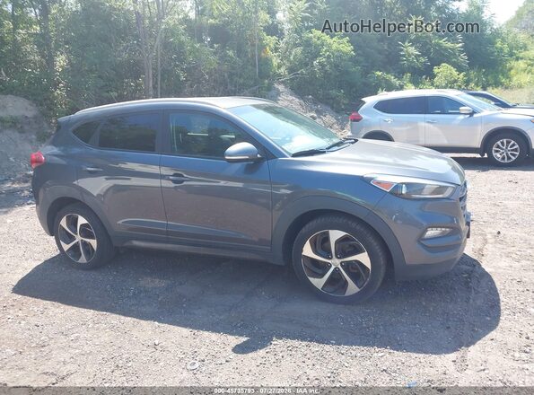 KM8J3CA2XGU178123 2016 HYUNDAI TUCSON Black Вид задньої частини салону