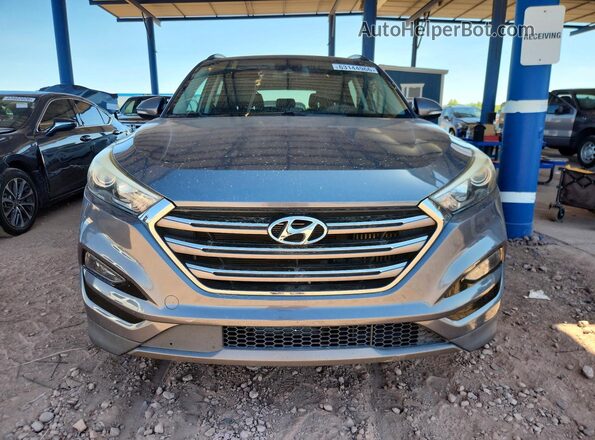 KM8J3CA2XGU178932 2016 HYUNDAI TUCSON Blue Front view