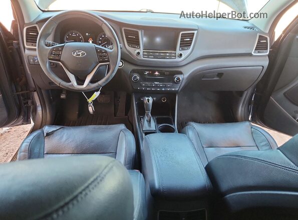 KM8J3CA2XGU178932 2016 HYUNDAI TUCSON Blue Dashboard view