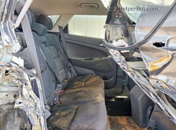 KM8J3CA40GU051009 2016 HYUNDAI TUCSON Gray Widok wnętrza z tyłu