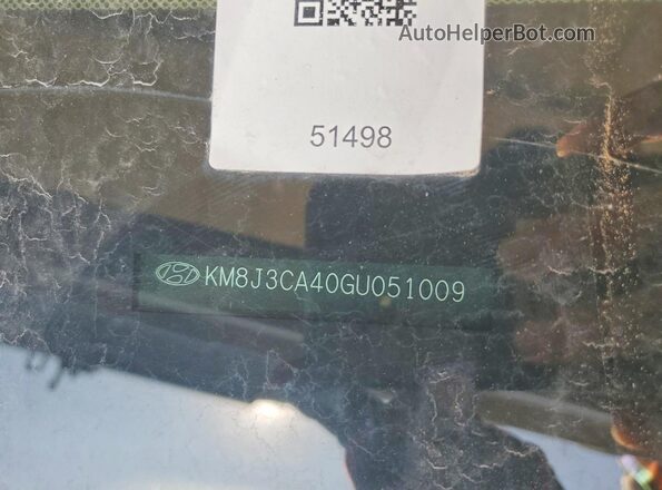 KM8J3CA40GU051009 2016 HYUNDAI TUCSON Gray Widok naklejki z numerem VIN