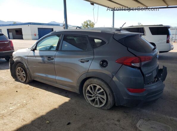KM8J3CA40GU051009 2016 HYUNDAI TUCSON Gray Tył lewy
