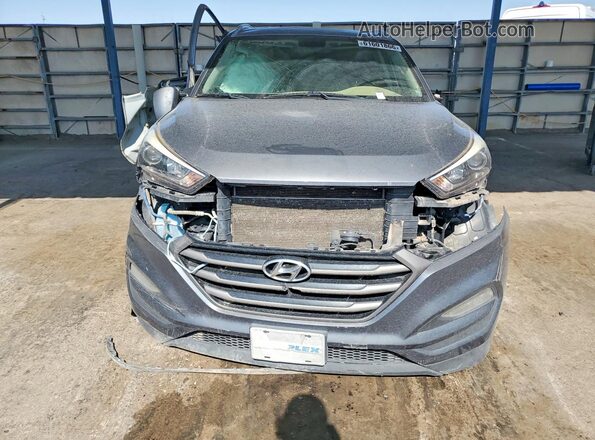 KM8J3CA40GU051009 2016 HYUNDAI TUCSON Gray Widok z przodu