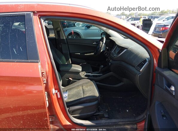 KM8J3CA40GU123407 2016 HYUNDAI TUCSON Brown Սալոնի դիմացի տեսք