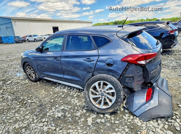 KM8J3CA40HU575228 2017 HYUNDAI TUCSON Gray Tył lewy