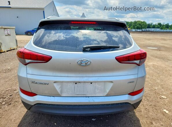 KM8J3CA42JU629652 2018 HYUNDAI TUCSON Серебряный Вид сзади