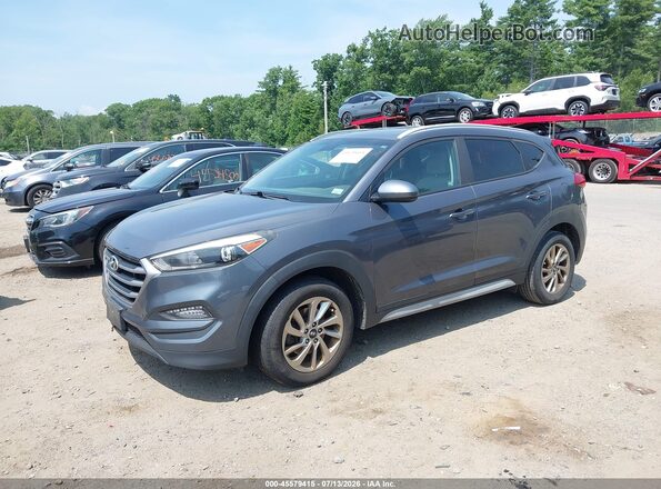 KM8J3CA42JU646967 2018 HYUNDAI TUCSON Gray წინა მარცხენა ხედი სამი მეოთხედიდან