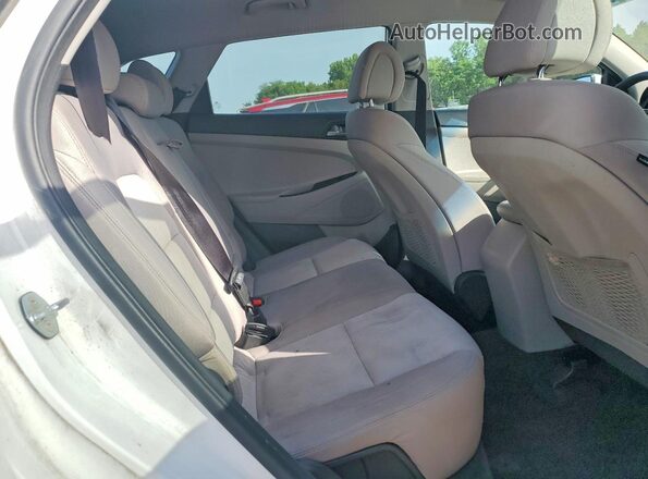 KM8J3CA44GU093022 2016 HYUNDAI TUCSON White Widok wnętrza z tyłu
