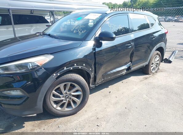 KM8J3CA44GU212316 2016 HYUNDAI TUCSON Black Widok z przodu