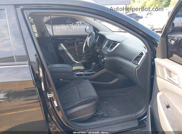 KM8J3CA44GU212316 2016 HYUNDAI TUCSON Black Widok wnętrza z przodu