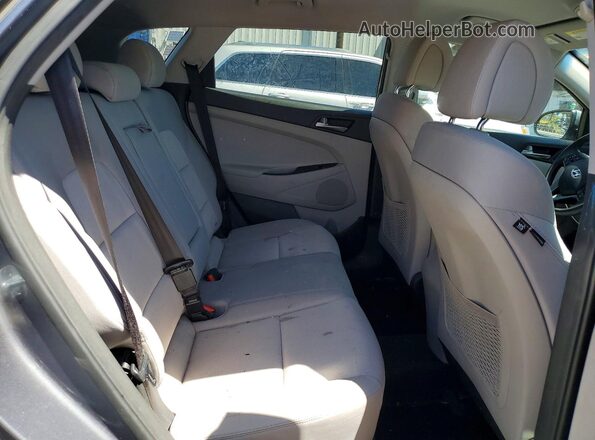 KM8J3CA44JU606941 2018 HYUNDAI TUCSON Gray Widok wnętrza z tyłu