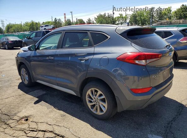 KM8J3CA44JU606941 2018 HYUNDAI TUCSON Gray Tył lewy