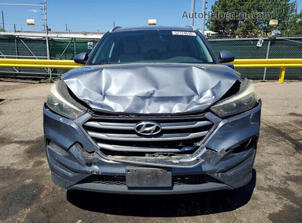 KM8J3CA44JU606941 2018 HYUNDAI TUCSON Gray Widok z przodu