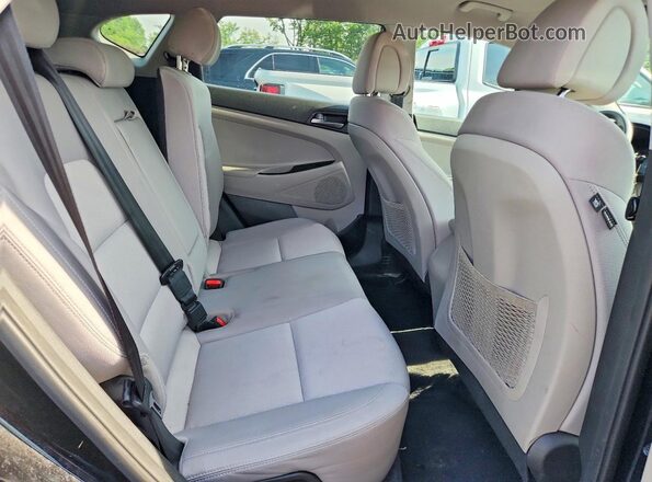 KM8J3CA44JU651328 2018 HYUNDAI TUCSON Black Vista de los asientos traseros
