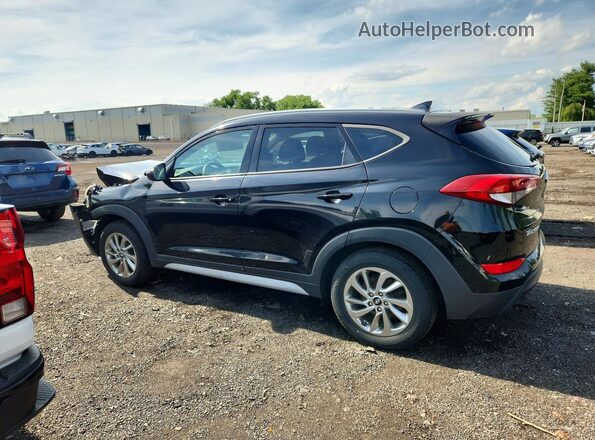 KM8J3CA44JU651328 2018 HYUNDAI TUCSON Black Trasero izquierdo