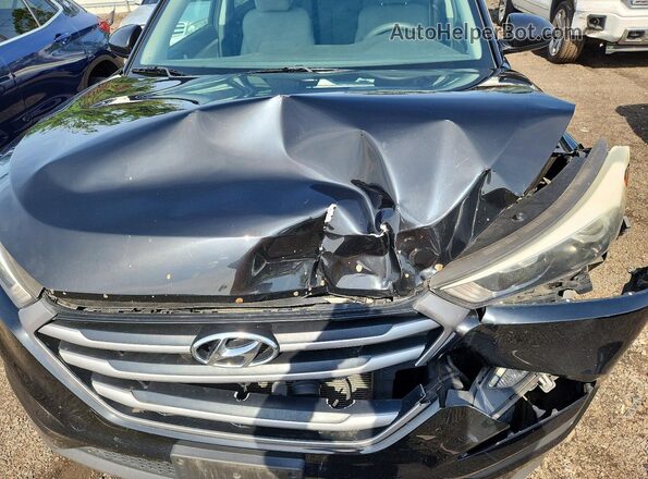 KM8J3CA44JU651328 2018 HYUNDAI TUCSON Black Vista interior trasera
