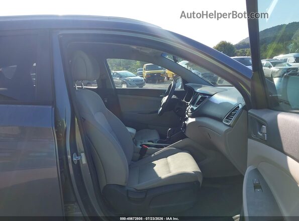 KM8J3CA44JU720888 2018 HYUNDAI TUCSON Gray Вид салону спереду