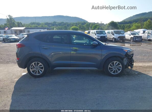 KM8J3CA44JU720888 2018 HYUNDAI TUCSON Gray Вид задньої частини салону