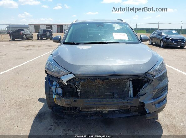 KM8J3CA44KU035937 2019 HYUNDAI TUCSON Серый Вид задней части салона