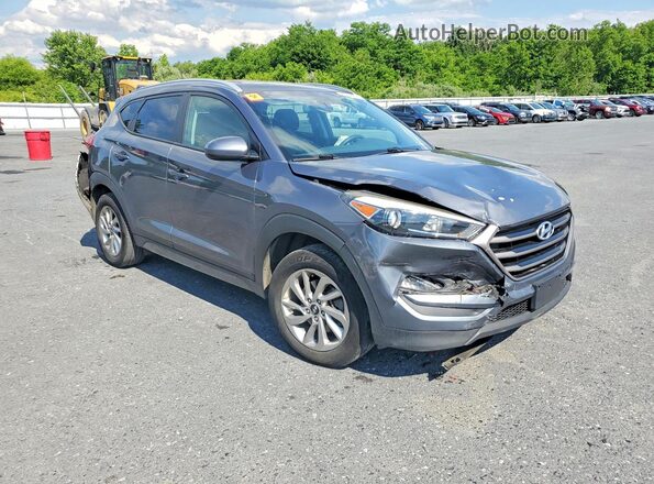 KM8J3CA45GU243204 2016 HYUNDAI TUCSON Silver Delantero derecho