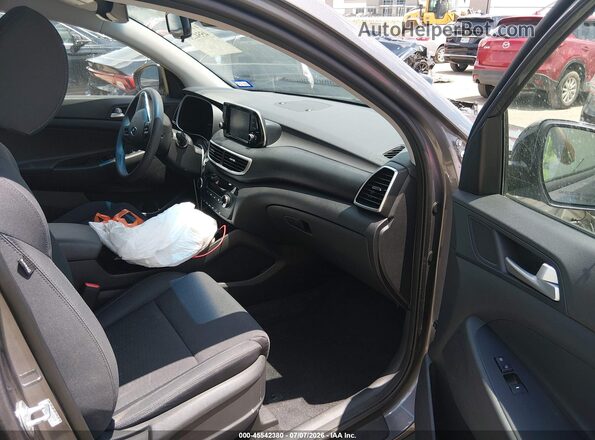 KM8J3CA45MU325199 2021 HYUNDAI TUCSON Серый Вид салона спереди