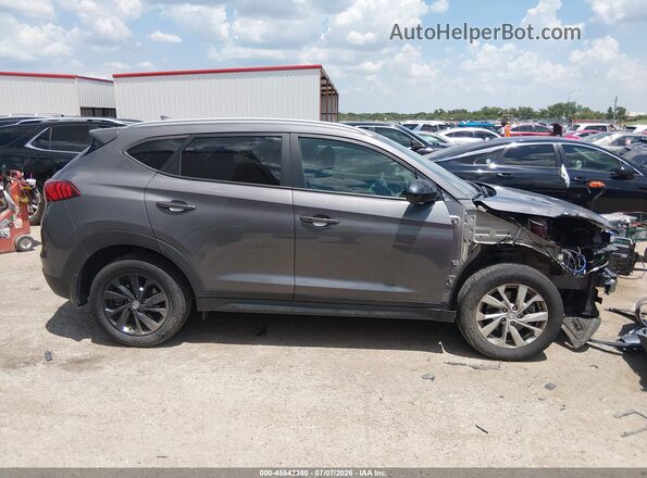 KM8J3CA45MU325199 2021 HYUNDAI TUCSON Серый Вид задней части салона