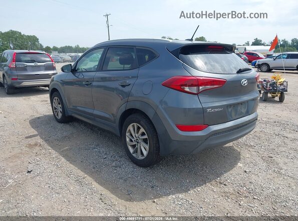 KM8J3CA46GU064816 2016 HYUNDAI TUCSON Gray Trasero izquierdo