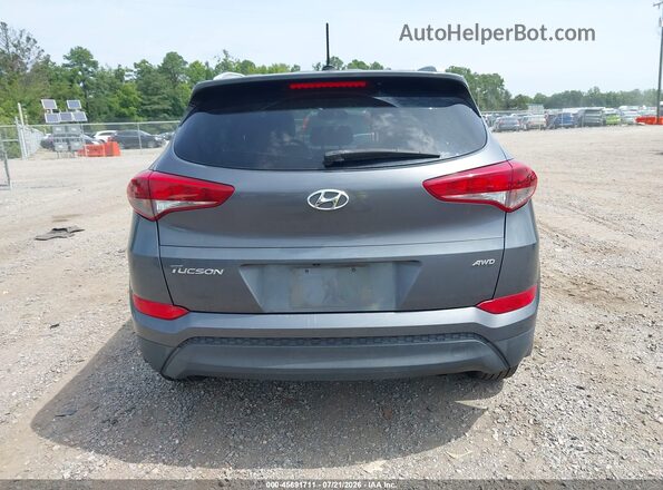 KM8J3CA46GU064816 2016 HYUNDAI TUCSON Gray 