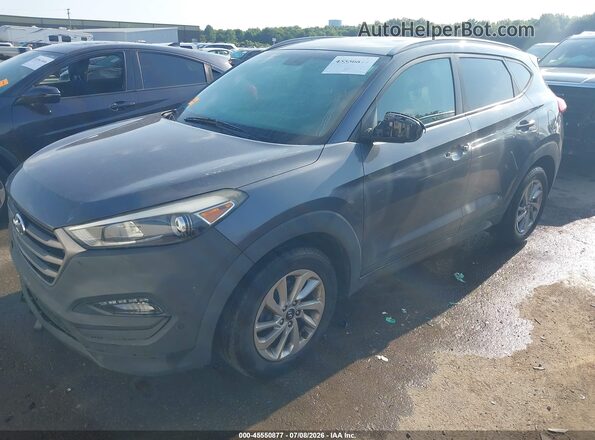 KM8J3CA47GU059446 2016 HYUNDAI TUCSON Gray Առջևի ձախ երեք քառորդ տեսարան