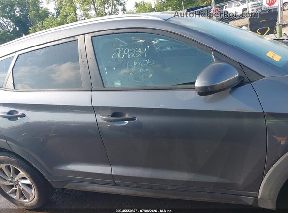 KM8J3CA47GU059446 2016 HYUNDAI TUCSON Gray Սալոնի հետևի տեսք