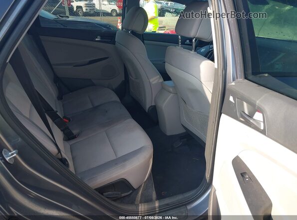 KM8J3CA47GU059446 2016 HYUNDAI TUCSON Gray VIN կոդի պիտակի տեսք