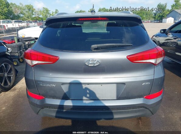 KM8J3CA47GU059446 2016 HYUNDAI TUCSON Gray 