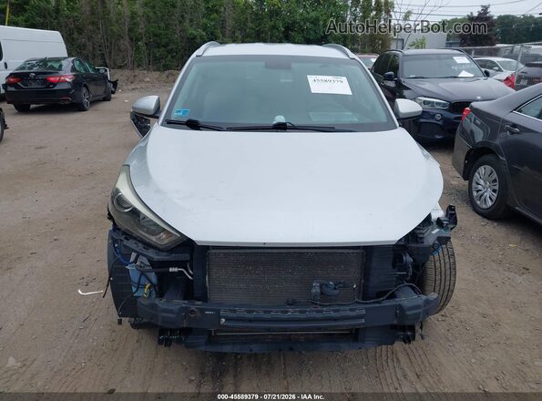 KM8J3CA47GU067918 2016 HYUNDAI TUCSON Silver Rear interior view