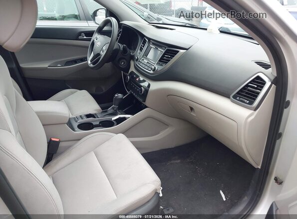 KM8J3CA47GU067918 2016 HYUNDAI TUCSON Silver Front interior view